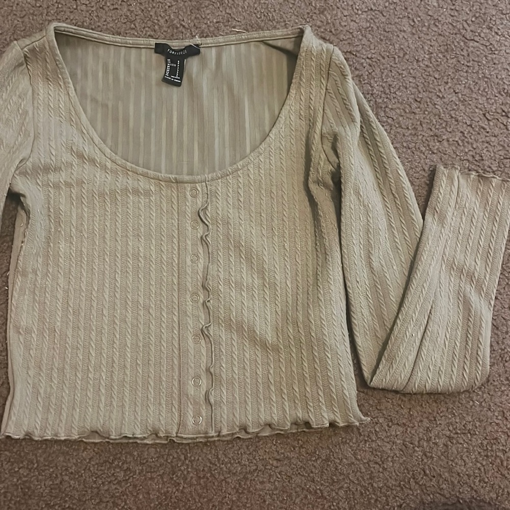 Green cropped top with lettuce edge sleeves and buttons